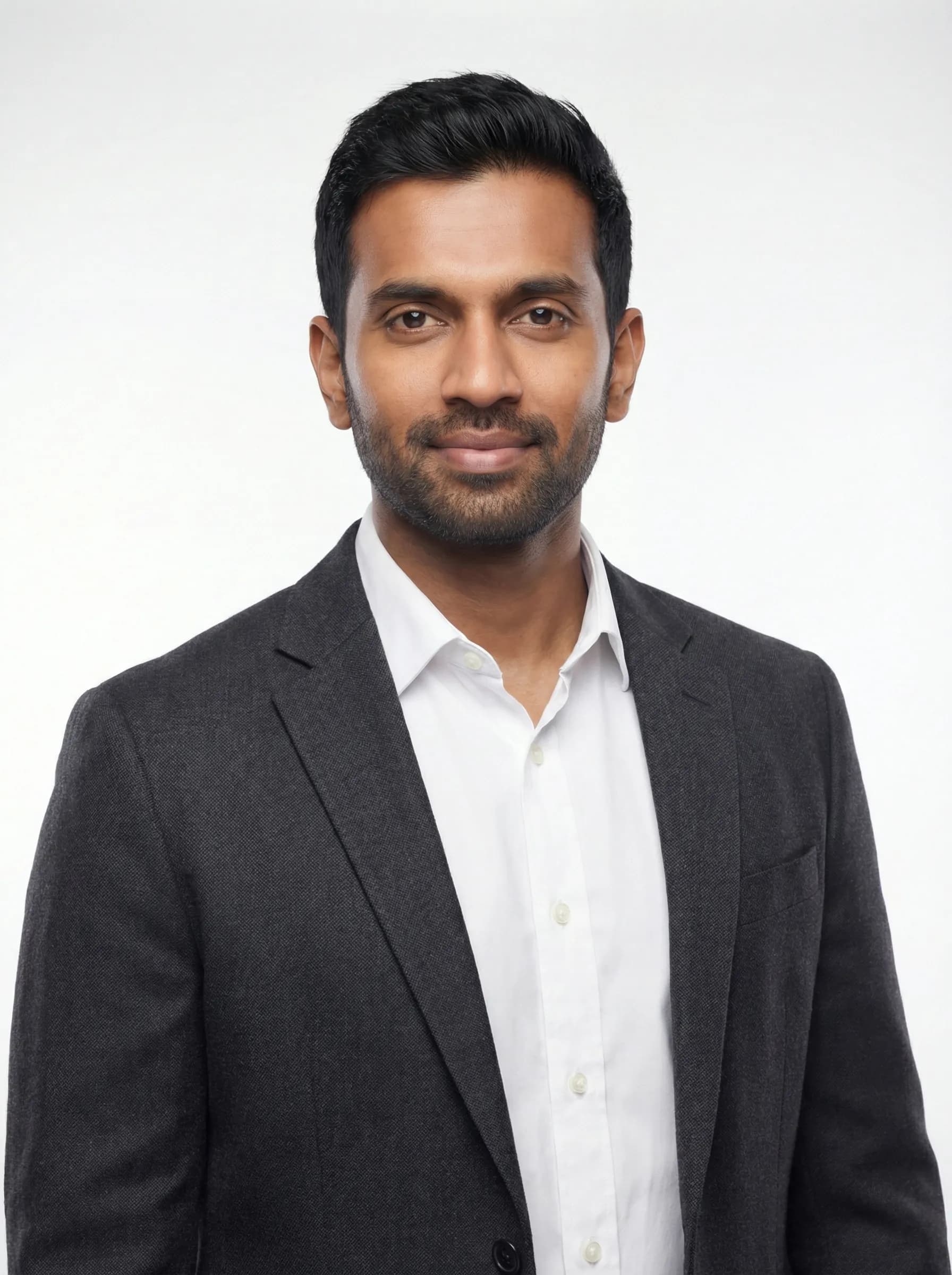 Technical lead headshot in dark gray blazer